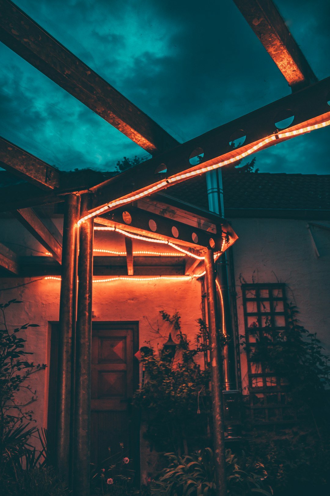 a building with lights on it and a door