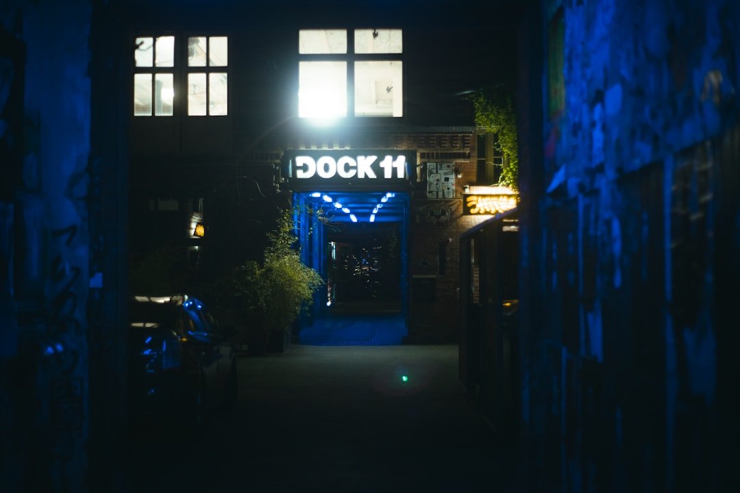 a street with a building and a sign on it