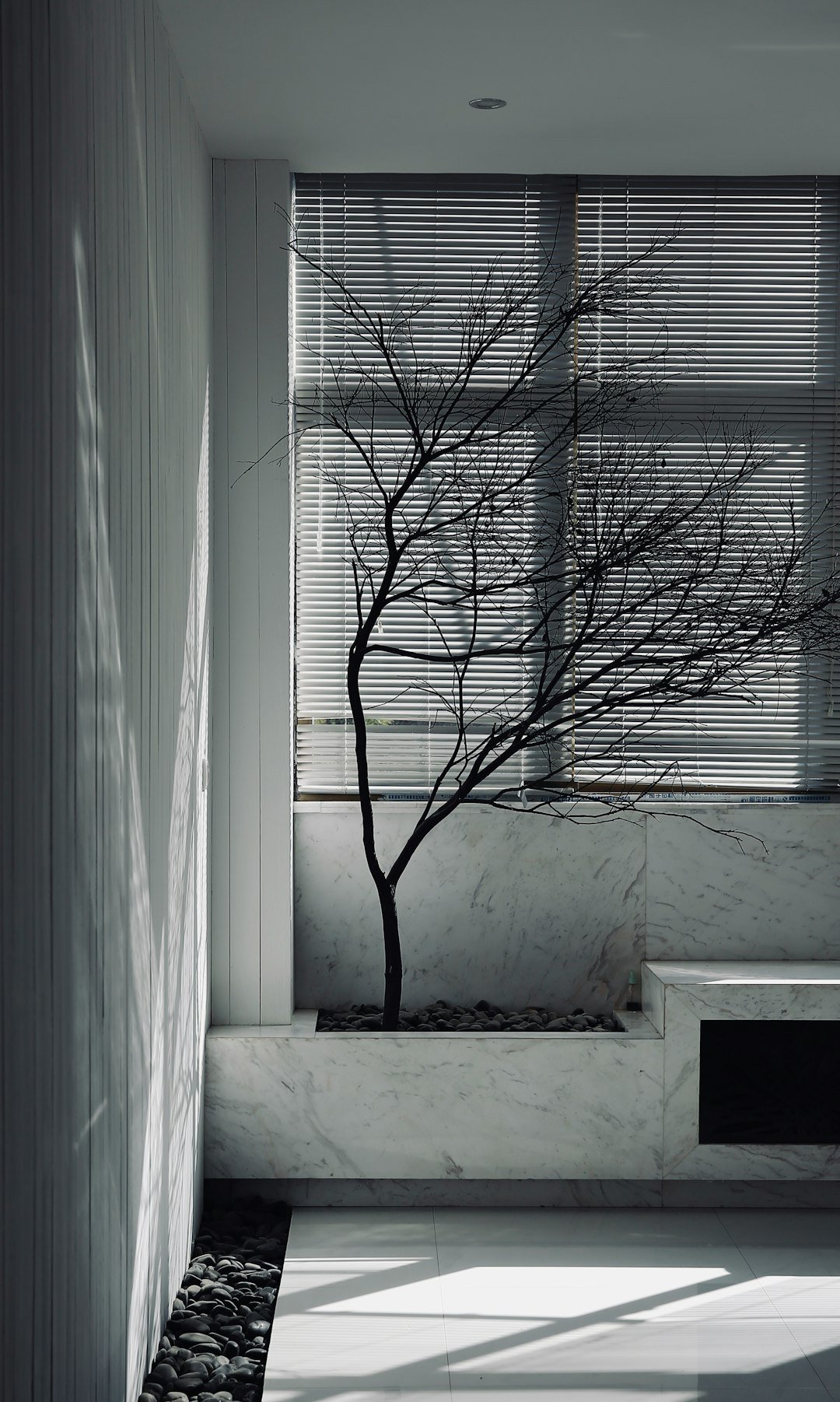 white window blinds on window