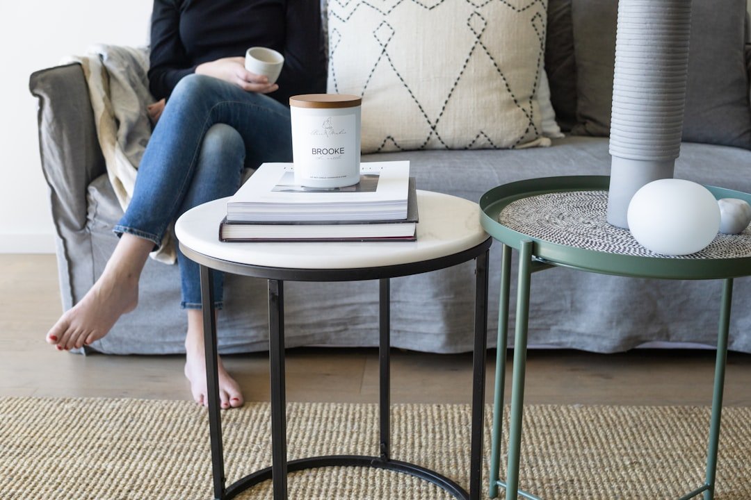 white ceramic mug on white round table