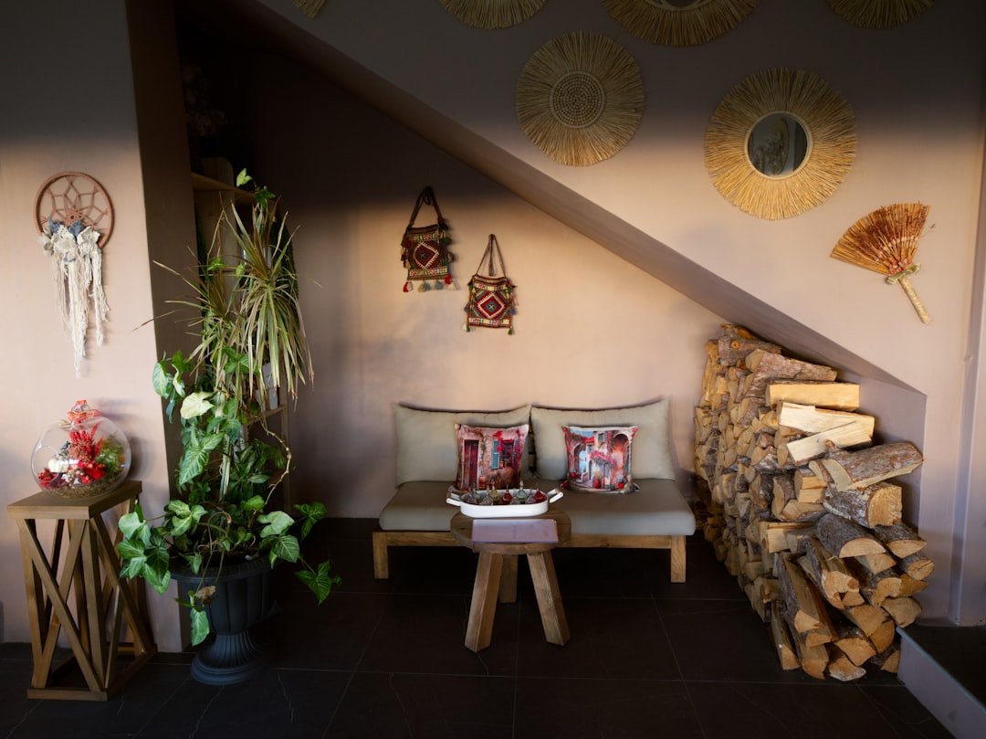 A living room with a bunch of wood stacked on top of each other