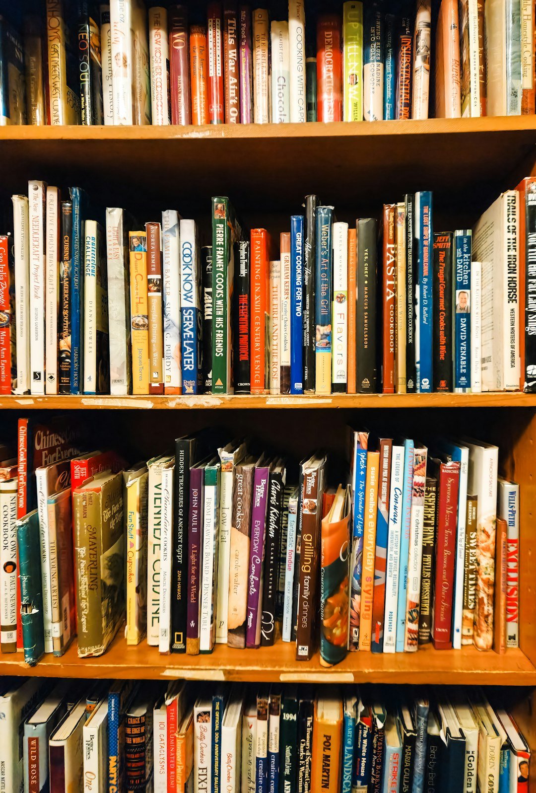 A book shelf filled with lots of books