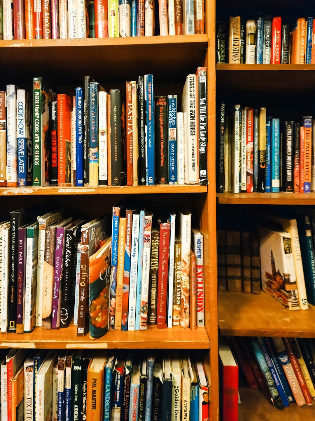 A book shelf filled with lots of books
