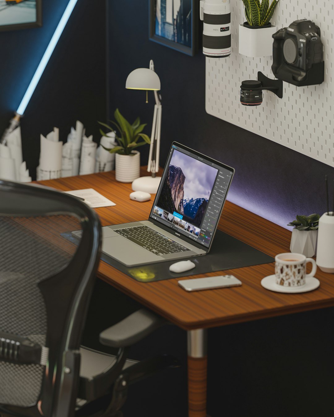 macbook pro on brown wooden table