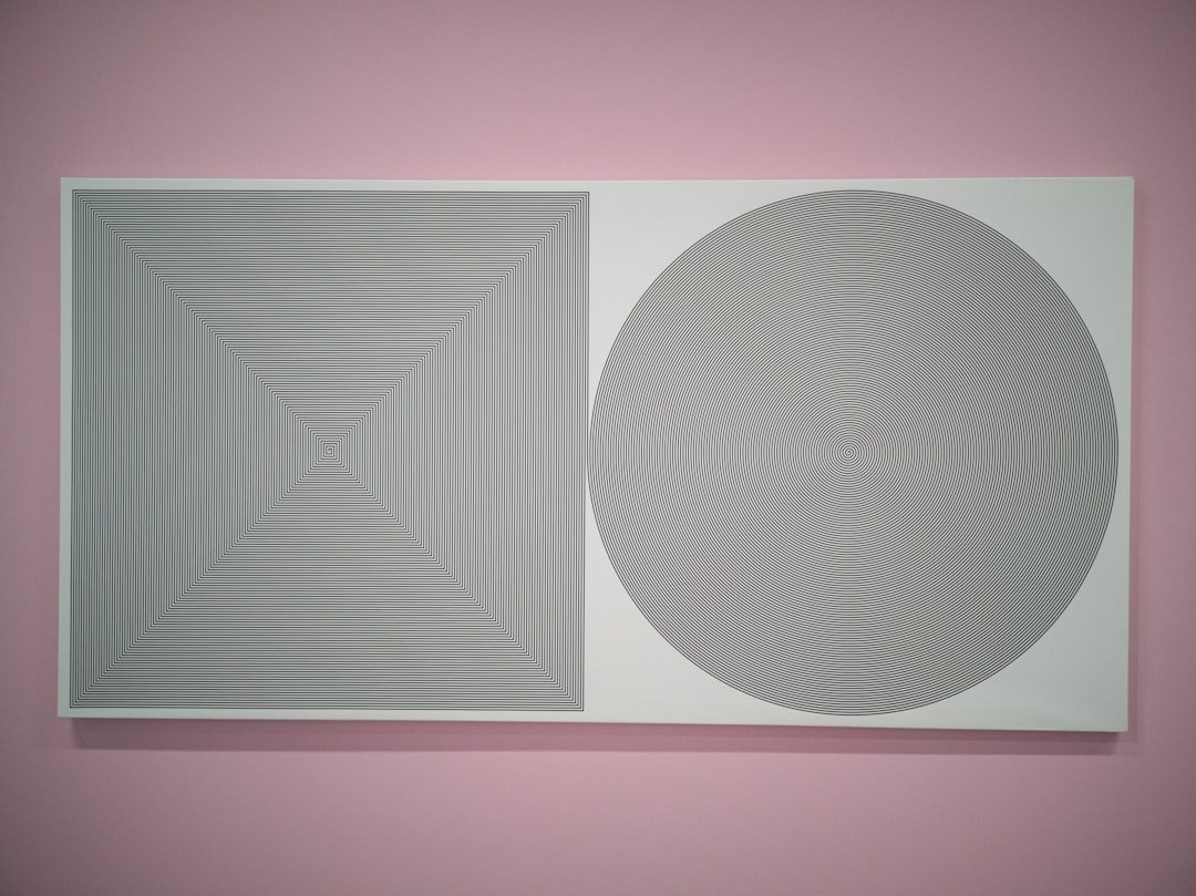 round gray and pink illustration