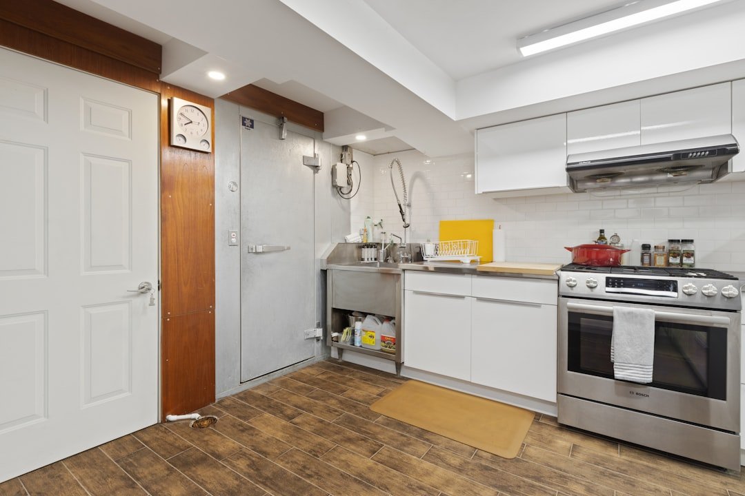 a kitchen with a stove and a sink