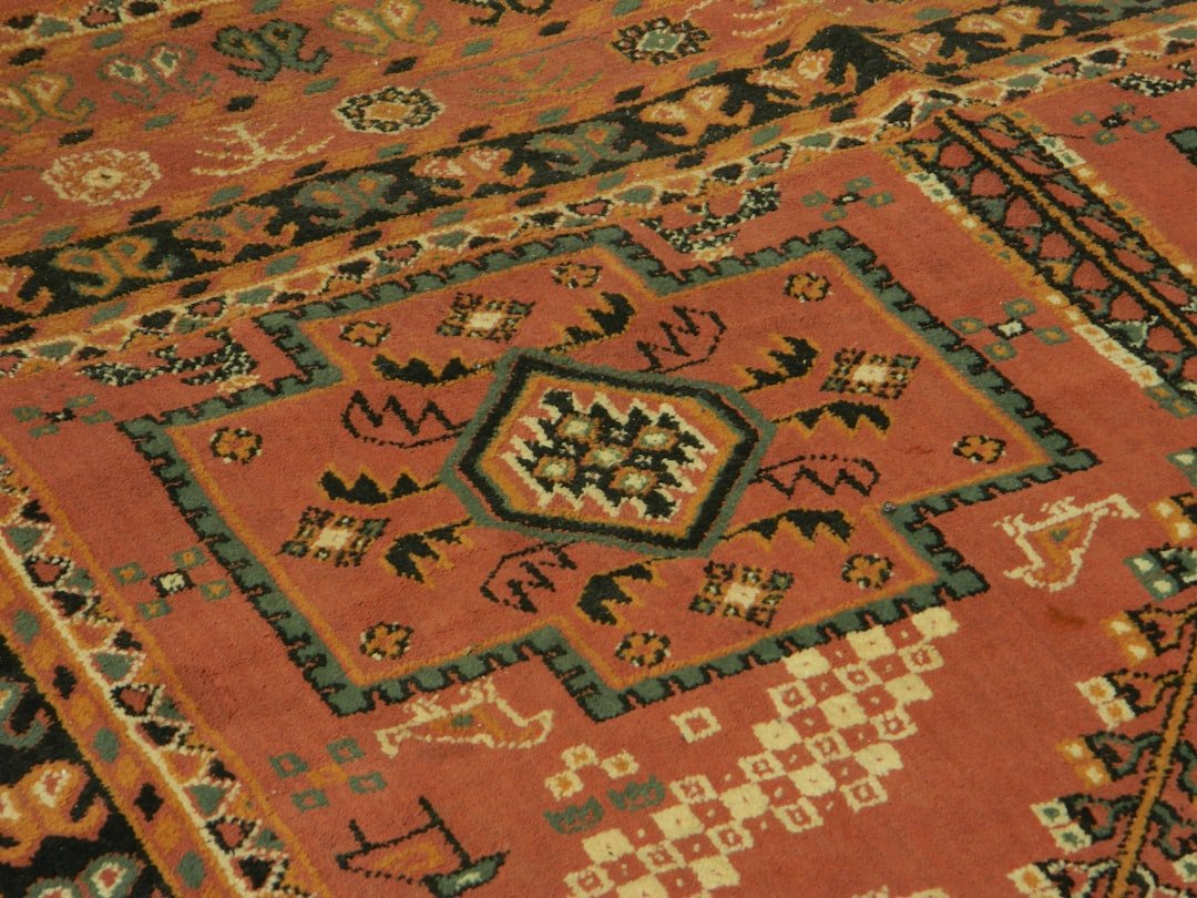 A close up of a rug with a pattern on it