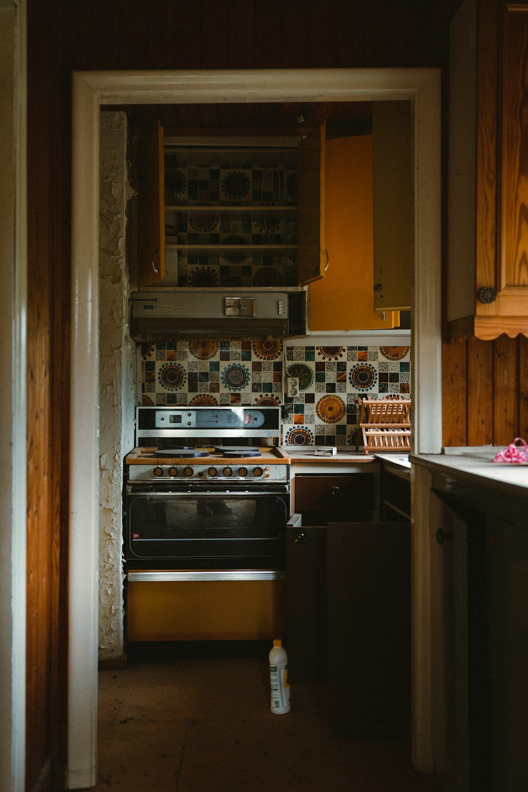 a kitchen with a stove and oven
