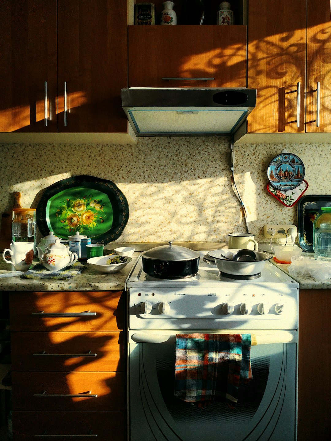 A stove top oven sitting inside of a kitchen