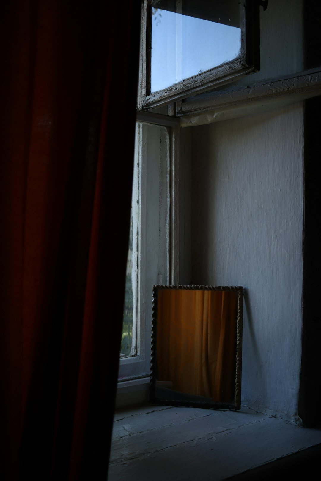 a window with a curtain