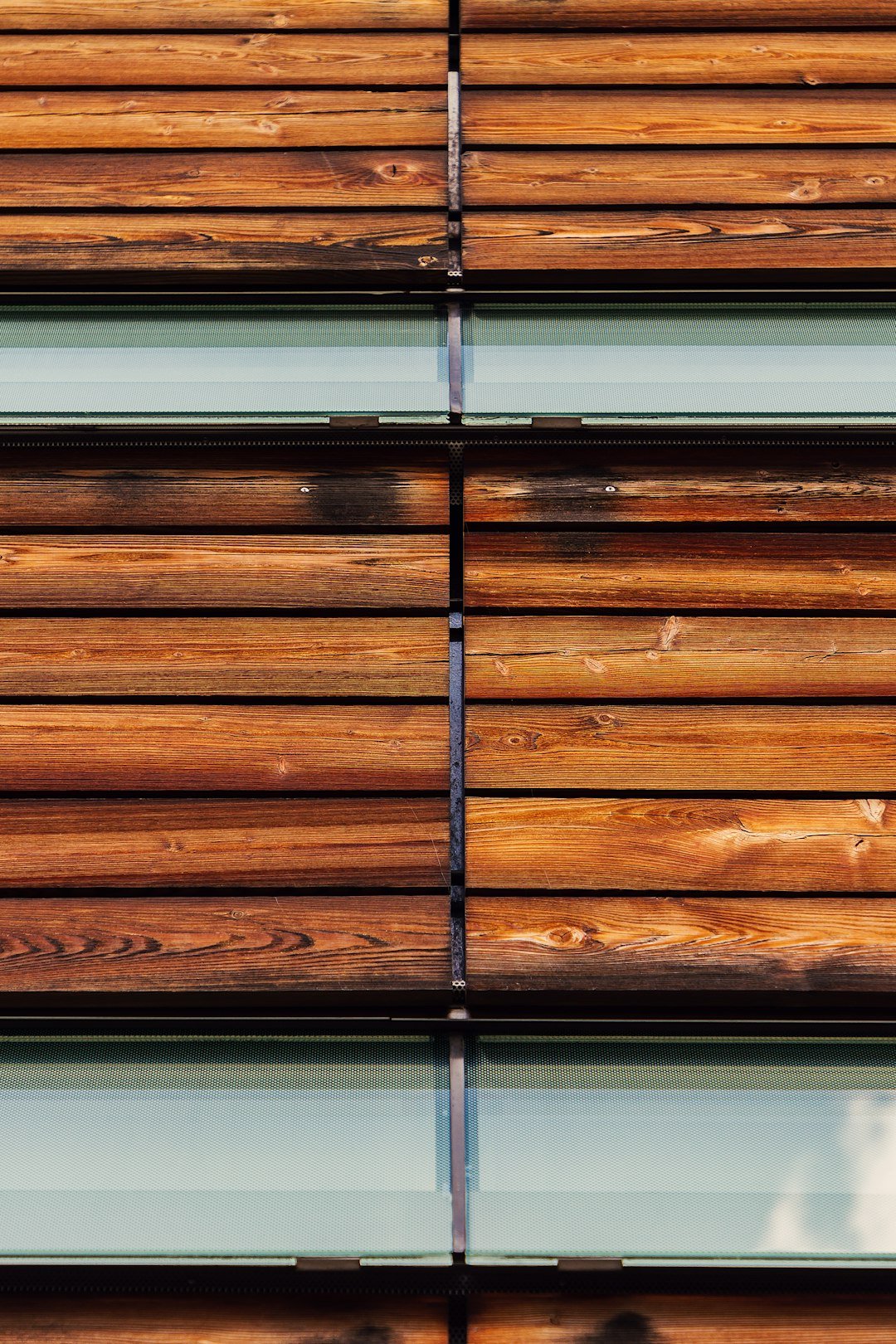 a close up of a wooden slatted wall
